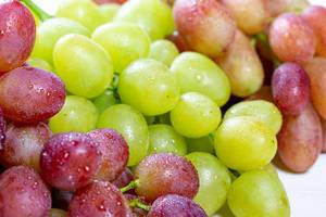 Different varieties of fresh ripe grapes