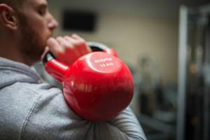 Doing Kettlebell Push Press with one arm