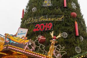 Dortmund celebrates christmas time 2019 with a hugh christmas tree with big baubles and xxl-candles on a German advent market
