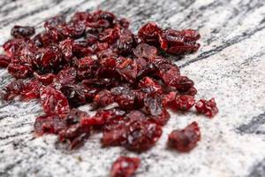 Dried Cranberries on the grey marble (Flip 2019)