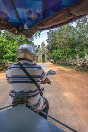 Driving towards Victory Gate in Siem Reap with a TukTuk