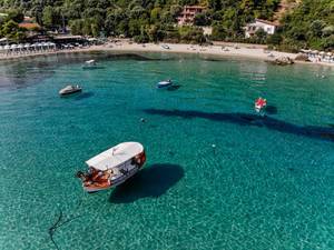 Drone photo of boats near the beach in Afitos, Chalkidiki