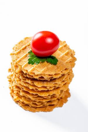 Dry wafer snacks with tomatoes and parsley
