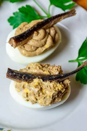 Eggs stuffed with yolk and sprats
