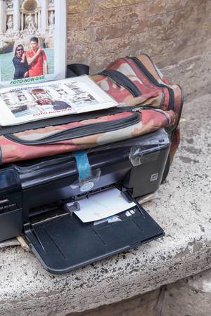 Ein mobiler Drucker für Touristenfotos in Rom
