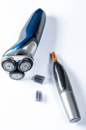 Electric shaver and trimmer for man on table