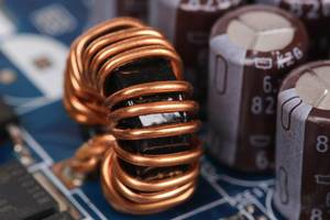Electromagnetic coil, inductor on circuit board close-up