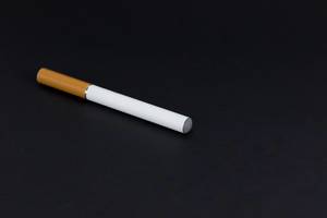 Electronic cigarette on black background