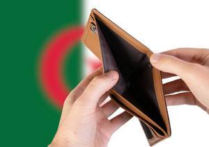Empty Wallet with Flag of Algeria. Recession and Financial Crisis to come with more debt and federal budget deficit?