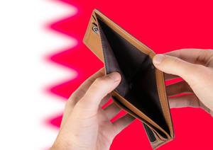 Empty Wallet with Flag of Bahrain. Recession and Financial Crisis to come with more debt and federal budget deficit?