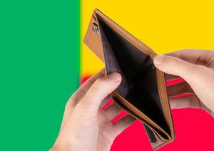 Empty Wallet with Flag of Benin. Recession and Financial Crisis to come with more debt and federal budget deficit?