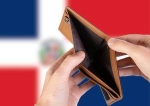 Empty Wallet with Flag of Dominican Republic. Recession and Financial Crisis to come with more debt and federal budget deficit?