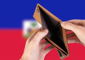 Empty Wallet with Flag of Haiti. Recession and Financial Crisis to come with more debt and federal budget deficit?