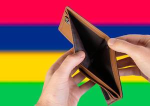 Empty Wallet with Flag of Mauritius. Recession and Financial Crisis to come with more debt and federal budget deficit?