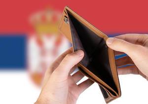 Empty Wallet with Flag of Serbia. Recession and Financial Crisis to come with more debt and federal budget deficit?