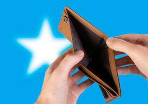 Empty Wallet with Flag of Somalia. Recession and Financial Crisis to come with more debt and federal budget deficit?