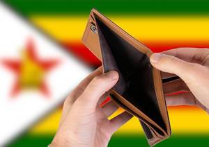 Empty Wallet with Flag of Zimbabwe. Recession and Financial Crisis to come with more debt and federal budget deficit?