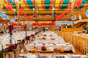 Endless rows of tables full with food prepared for the start of Oktoberfest