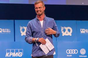 Entertainer and entrepreneur Joko Winterscheidt on the stage of the Bits & Pretzels startup conference in Munich, Germany