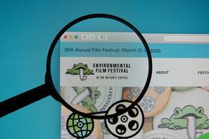 Environmental Film Festival logo on a computer screen with a magnifying glass