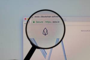 EOS logo on a computer screen with a magnifying glass