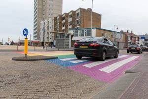 Exceptional pedestrian stripe in purple, blue, green, yellow, orange and red in Zandvoort, Netherlands