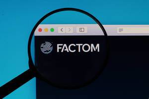 FACTOM logo under magnifying glass
