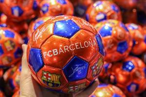 FC Barcelona football in club colors with signatures and autographs of the football players, in Spain