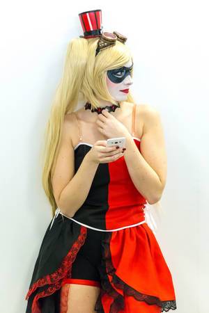 Female cosplayer with black-red dress and make-up