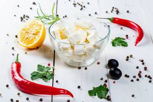 Feta cheese with spices, lemon and herbs