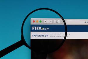 FIFA logo under magnifying glass