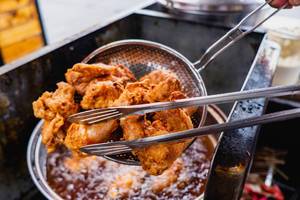 Filtering cooking oil from fried chicken (Flip 2019)