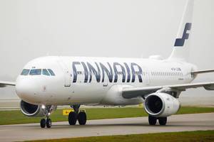 Finnair airplane taxiing in Munich Airport
