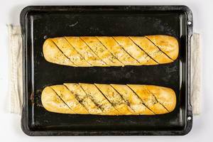 Flat lay above baked Bread Bruschetta on the baking tray (Flip 2019)
