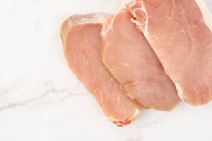 Flat lay above Fresh Raw Pork Chops