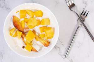 Flat lay above Peaches and Mango in the Greek Yogurt (Flip 2019)
