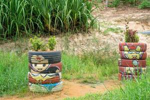 Flower Planters made of Tires with Superhero Painting in Mui Ne, Vietnam