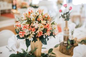 Flowers as center pieces at wedding table