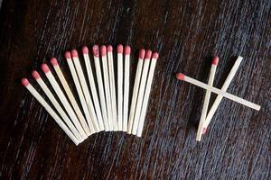Formation of matches over wooden table