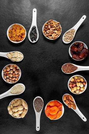 Frame-of-healthy-food-products-dried-fruits-nuts-and-seeds-top-view.jpg