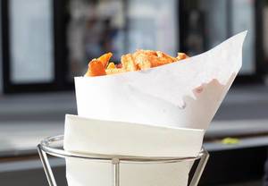 French fries in a paper wrapper