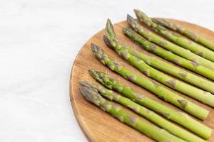 Fresh Asparagus on the wooden board