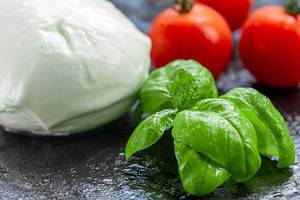 Fresh Basil leaves, tomatoes and mozzarella cheese (Flip 2019) (Flip 2019)