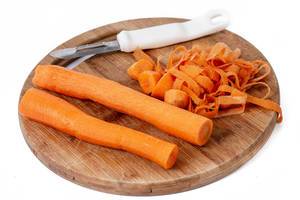 Fresh Carrot on the wooden board (Flip 2019)