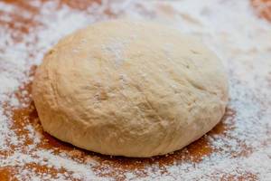 Fresh dough with flour