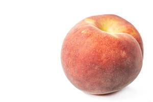 Fresh Raw Peach isolated above white background