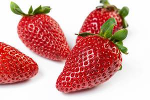 Fresh Red Strawberries on the white background