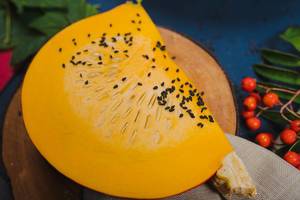 Fresh Ripe Pumpkin With Black Seeds On The Top