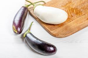 Fresh ripe purple and white eggplant