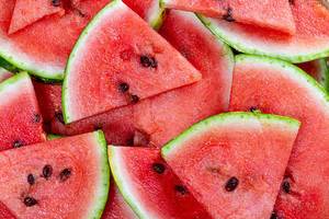 Fresh ripe watermelon slices background (Flip 2019)